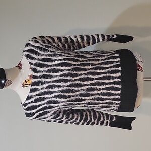 SISTERS zebra stripped fuzzy knit sweater.  Size is Large.
